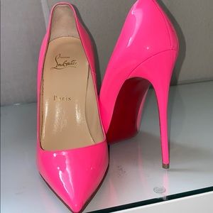 A pair of  Original Christian Louboutin Shoes
